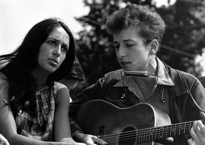 A photo of Bob Dylan and a girl